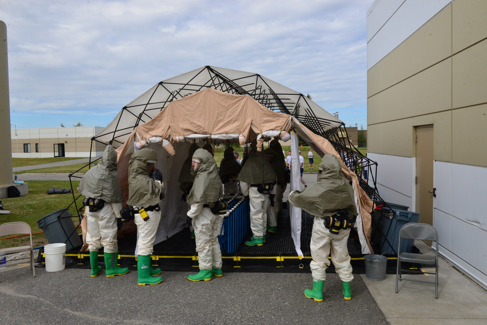 The Icemen of the 354th Medical Group conducted an extensive training exercise encompassing hands-on Self-Aid Buddy Care, litter carries, and patient decontamination, July 25, 2018.