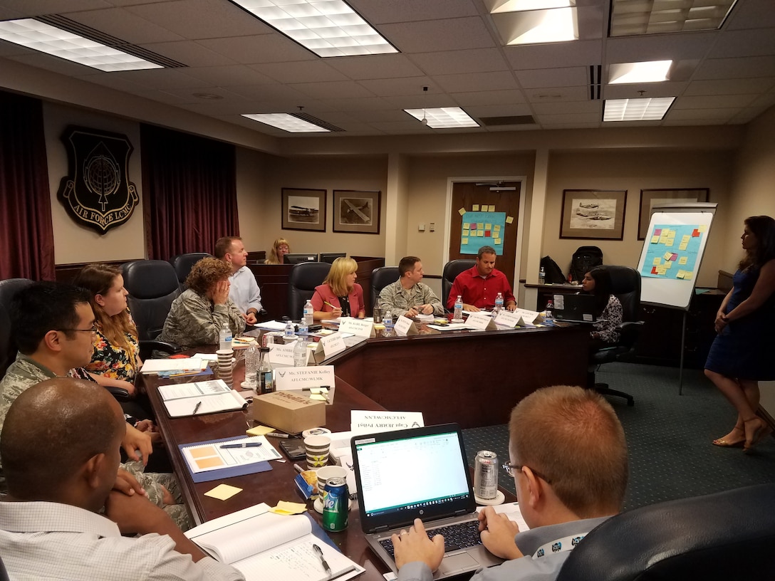 Members of the Strategic Acquisition Leadership Team or SALT, discuss Air Force acquisition issues during a recent meeting at the Air Force Life Cycle Management Center headquarters. (U.S. Air Force photo/Brian Brackens)