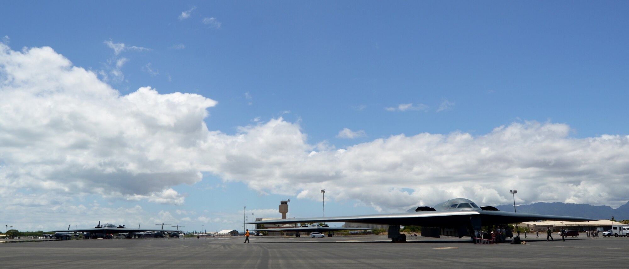 U.S. Air Force B-2 Spirits, deployed from Whiteman Air Force Base, Missouri, land at Joint Base Pearl Harbor-Hickam, Hawaii, Aug. 15, 2018. B-2s regularly rotate through the Indo-Pacific to conduct routine air operations, which integrate capabilities with key regional partners and demonstrate U.S. commitment to peace and stability in the region. These operations are in support of the U.S. Strategic Command’s Bomber Task Force deployment. (U.S. Air Force photo by Staff Sgt. Danielle Quilla)