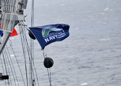 The guided-missile cruiser USS Princeton (CG 59) flies the Energy Security flag during the Great Green Fleet demonstration portion of the Rim of the Pacific (RIMPAC) 2012 exercise.