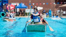 Airman 1st Class Tara Stetler, 375th Air Mobility Wing Public Affairs photojournalist, and Airman 1st Class Kylie Walker, 375th AMW PA broadcast journalist, row their boat to victory