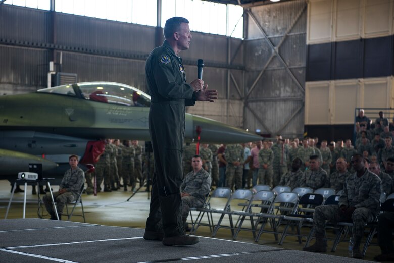 U.S. Air Force Gen. Tod D. Wolters, U.S. Air Forces in Europe-Air Forces Africa commander, speaks during an all call in Hangar 1 at Spangdahlem Air Base, Germany, Aug. 16, 2018. Wolters highlighted the importance of the NATO alliance and the value of conducting interoperability training with our European allies. (U.S. Air Force photo by Airman 1st Class Valerie Seelye)