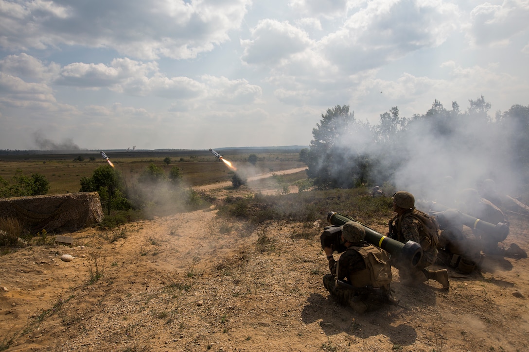 Marines with Weapons Company, 3rd Battalion, 25th Marine Regiment, fire two FGM-148 Javelin Missiles in a volley during Exercise Northern Strike at Camp Grayling, Mich., Aug. 14, 2018. Camp Grayling, the largest National Guard center in the country covering 147,000 acres, offers many large artillery, mortar, tank ranges and maneuver courses.
