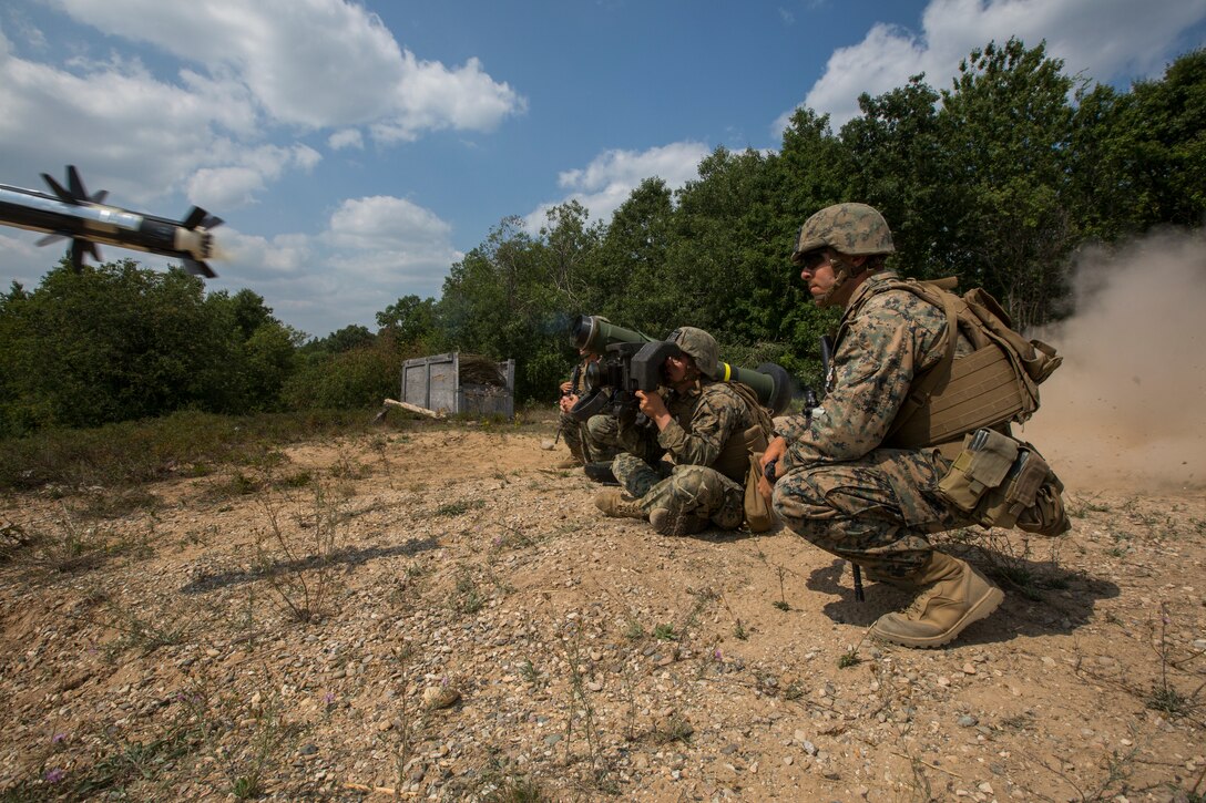 A Marine with Weapons Company, 3rd Battalion, 25th Marine Regiment, fires an FGM-148 Javelin Missile during Exercise Northern Strike at Camp Grayling, Mich., Aug. 14, 2018. Camp Grayling, the largest National Guard center in the country covering 147,000 acres, offers many large artillery, mortar, tank ranges and maneuver courses.