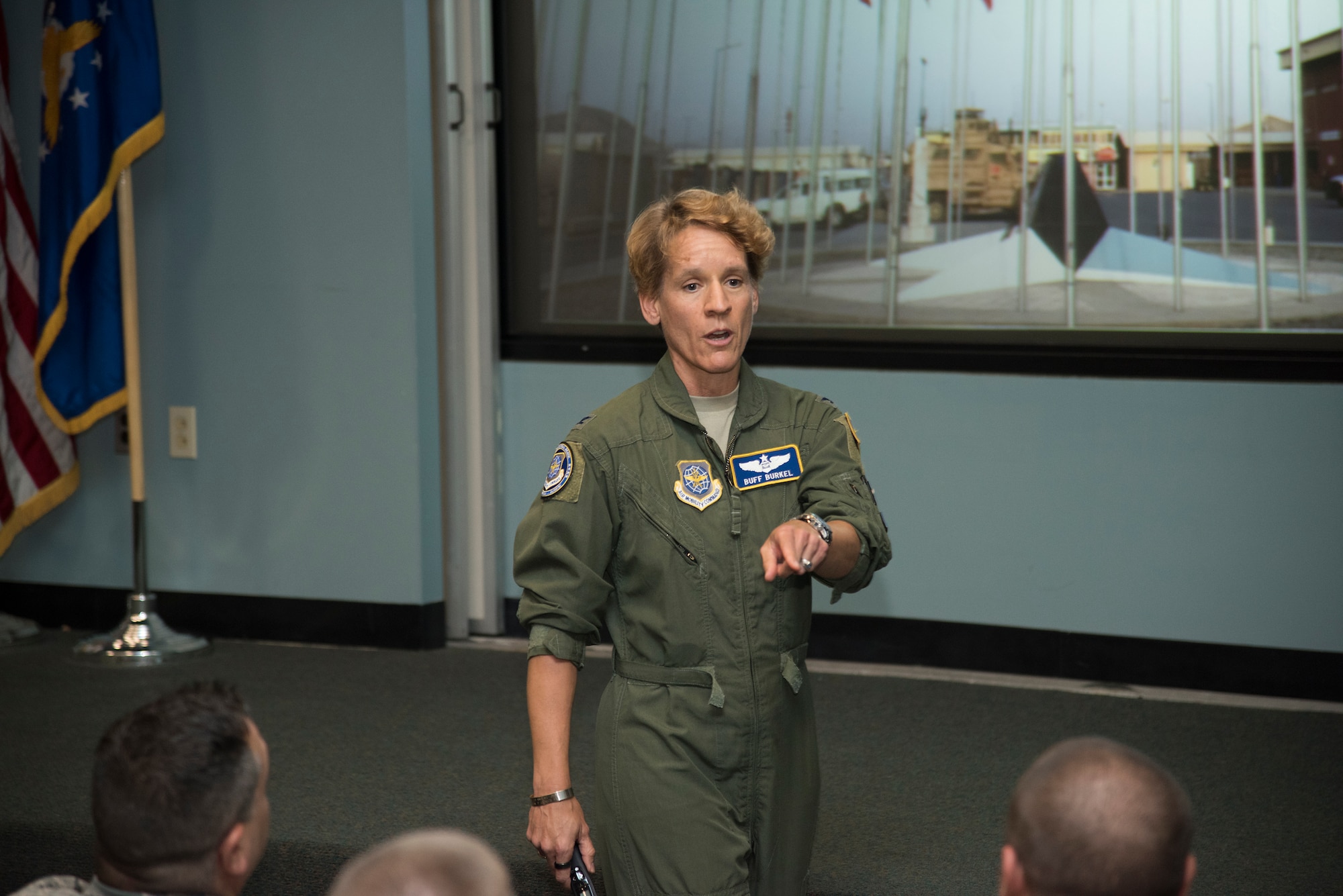 U.S. Air Force Col. Laurel “Buff” Burkel speaks to Airmen assigned to the 105th Airlift Wing at Stewart Air National Guard Base, N.Y., Aug. 4, 2018. Burkel was medically evacuated back to the U.S. on a 105th C-17 Globemaster III. (U.S. Air National Guard photo by Staff Sgt. Julio A. Olivencia Jr.)