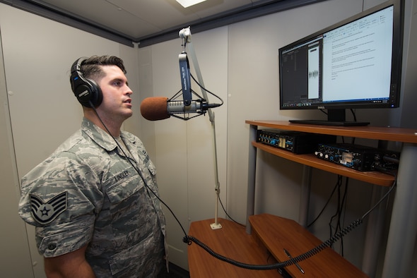 Staff Sgt. Jared Lindley, 2nd Weather Squadron NCO in charge of American Forces Network Weather Center (AFNWC), records a voiceover for a Southwest Asia forecast Aug. 9, 2018, at Offutt Air Force Base, Nebraska. The AFNWC’s forecasts reach almost a million service members, government employees and their families through American Forces Network and Stars and Stripes. (U.S. Air Force photo by Paul Shirk)