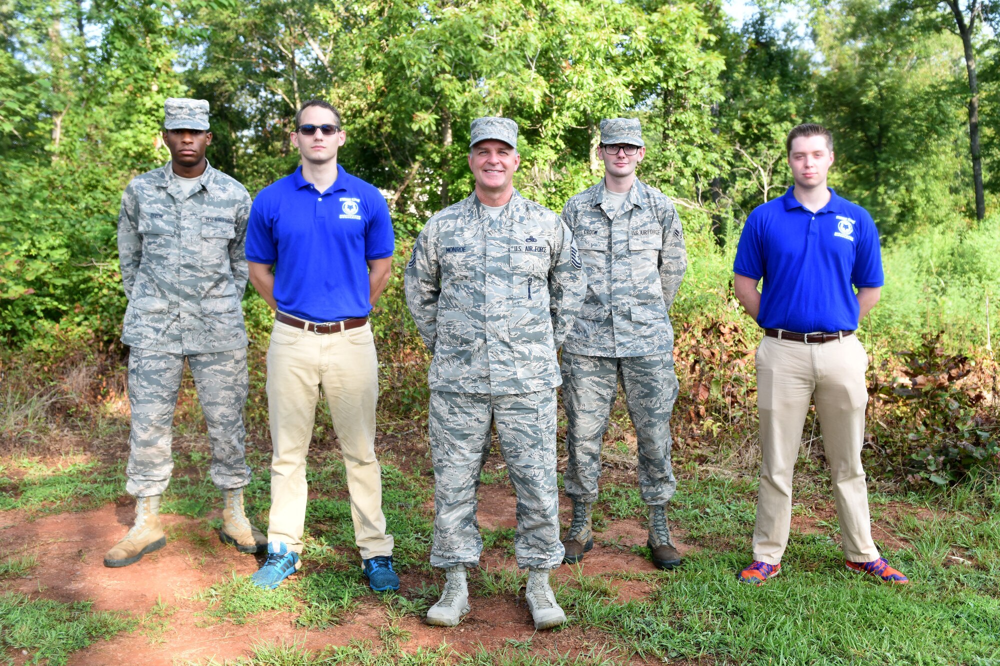Master Sgt. Kenny Monroe, 169th Fighter Wing Recruiting and Retention Office Manager poses with Airmen from the 169th Student Flight