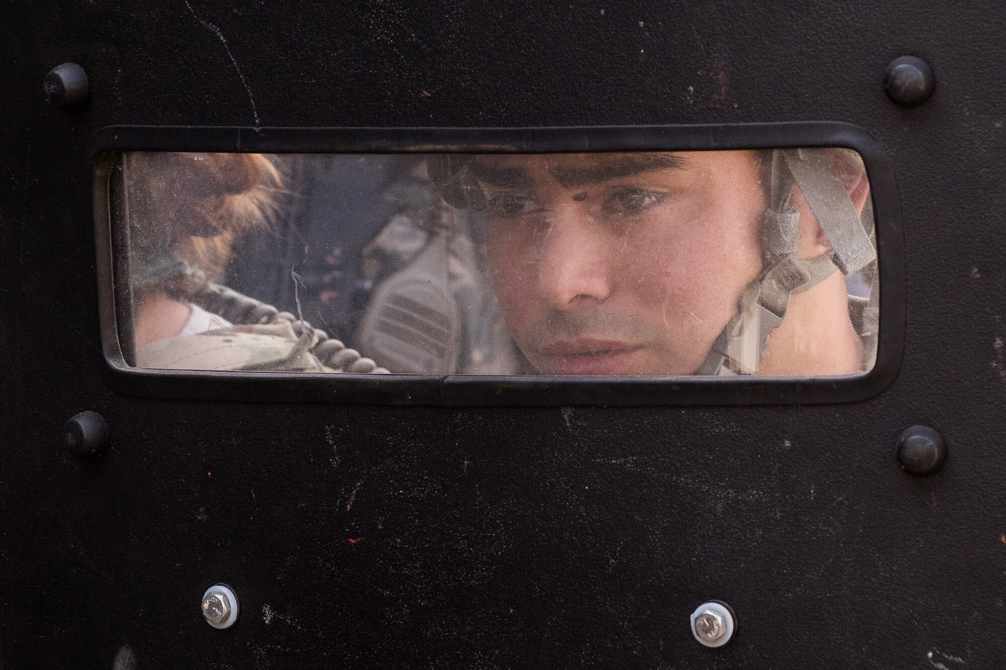 Senior Airman Jose Perez, 2nd Security Forces Squadron emergency services team member, clears an area during a hijacking exercise at Barksdale Air Force Base, La., August 14, 2018. Air Force and DoD instructions direct annual exercises to keep units mission ready. These exercises range from hijackings to active shooters. (U.S. Air Force photo by Airman 1st Class Tessa B. Corrick)