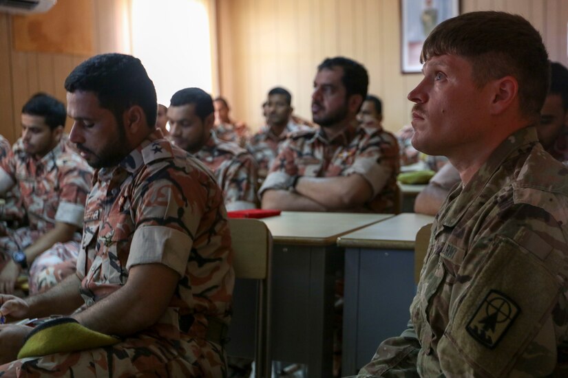 U.S. Army Staff Sgt. Christopher Reitz, a team leader assigned to the 157th Military Engagement Team, Wisconsin Army National Guard, attached to U.S. Army Central, takes notes in a class held in Oman as part of an engagement between the USARCENT and the Royal Army of Oman's Border Guard Brigade in Haima, Oman, Aug. 5, 2018. The engagement provided both military forces an opportunity to share their preferred methods of conducting border security.