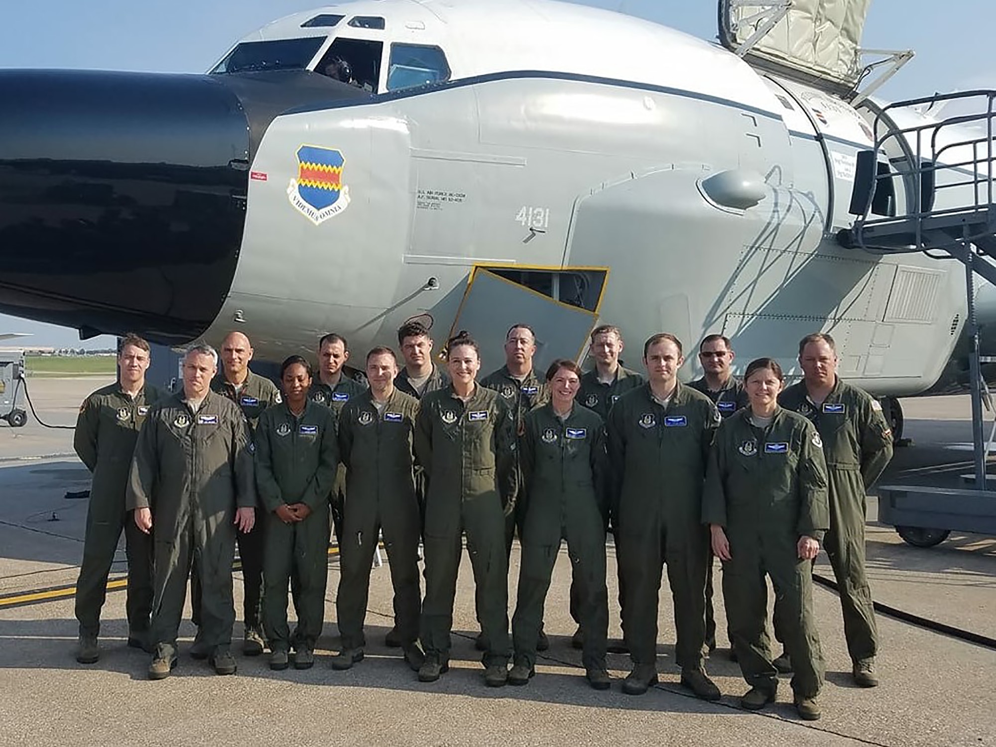 Members of the 655th Intelligence, Surveillance and
Reconnaissance Group 49th Intelligence Squadron pose outside an RC-135V/W Rivet Joint reconnaissance aircraft during a historic training mission at Offutt Air Force Base, Nebraska, August 5, 2018.