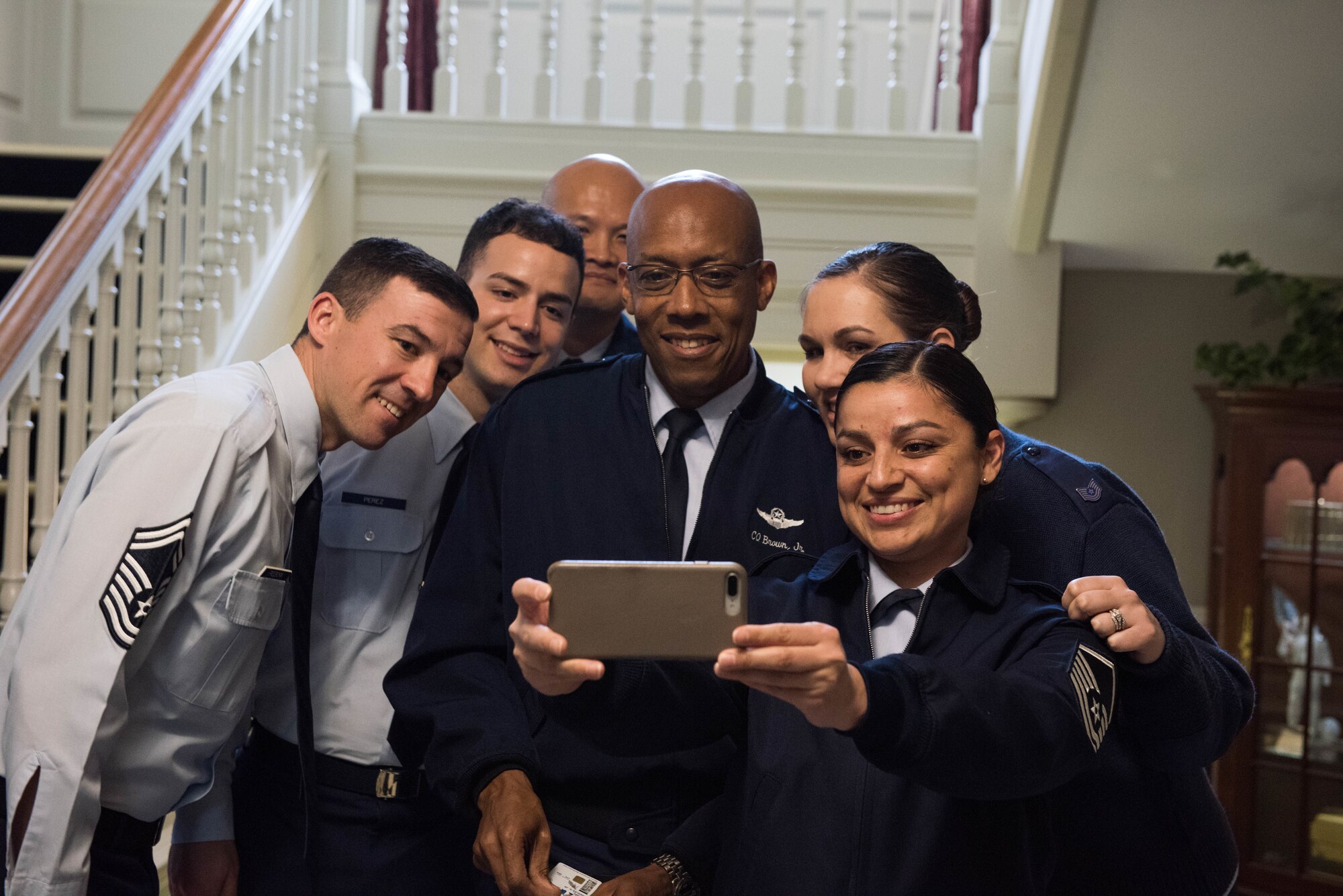 Gen. CQ Brown, Jr., Pacific Air Forces commander, takes a photo with 337th Air Support Flight Airmen at the U.S. Embassy in Canberra, Australia, Aug. 10, 2018. His first trip to the region since taking command on July 26, 2018, Brown also met with key defense and military leaders in Canberra and Royal Australian Air Force Bases Williamtown, Tindal and Darwin to see first-hand the strength of the U.S.-Australia alliance and discuss opportunities to ensure a free and open Indo-Pacific region. (U.S. Air Force photo by Staff Sgt. Hailey Haux)