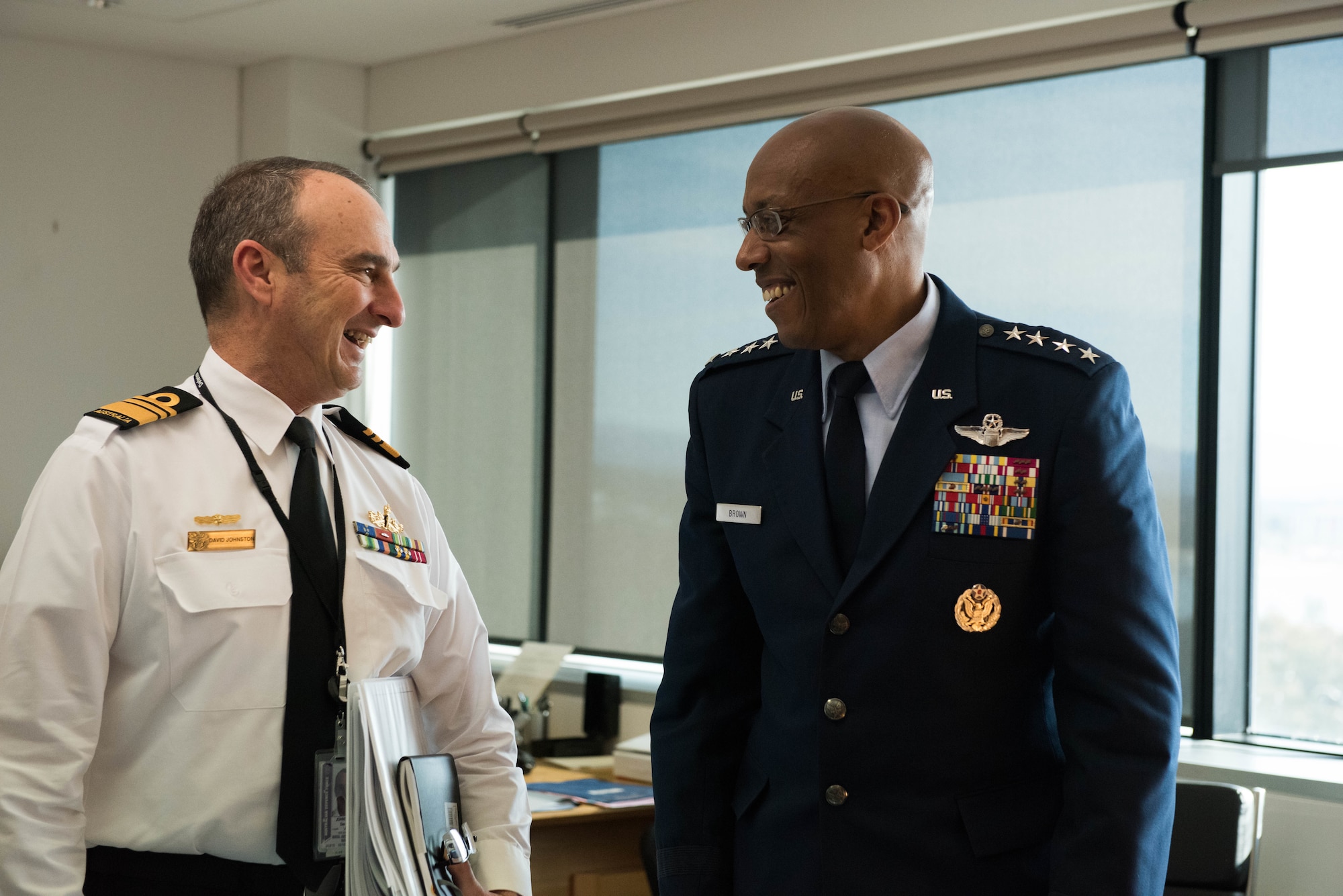 Gen. CQ Brown, Jr., Pacific Air Forces commander, attends an office call with Vice Admiral David Johnston, Australian Defense Force vice chief, at the Russell offices, Canberra, Australia, Aug. 10, 2018. His first trip to the region since taking command on July 26, 2018, Brown met with key defense and military leaders in Canberra and Royal Australian Air Force Bases Williamtown, Tindal and Darwin to see first-hand the strength of the U.S.-Australia alliance and discuss opportunities to ensure a free and open Indo-Pacific region. (U.S. Air Force photo by Staff Sgt. Hailey Haux)