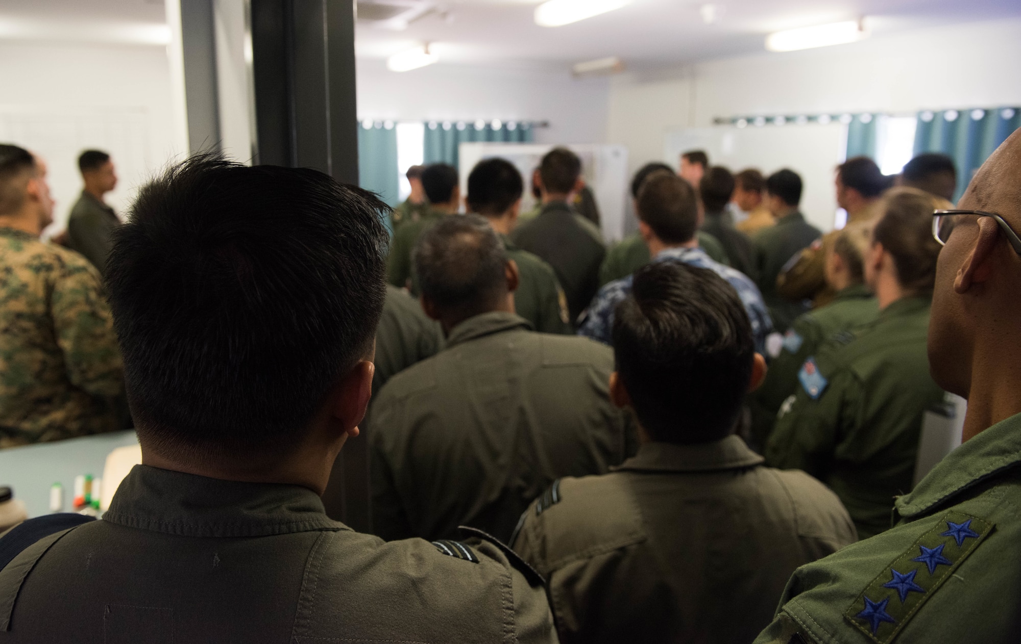 Gen. CQ Brown, Jr., Pacific Air Forces commander, attends an Exercise Pitch Black 18 planning event at Royal Australian Air Force Base Darwin, Australia, Aug. 13, 2018. This year’s biennial multinational large force employment exercise is the largest since its inception, involves 16 nations, 140 aircraft and more than 4,000 personnel. (U.S. Air Force photo by Staff Sgt. Hailey Haux)