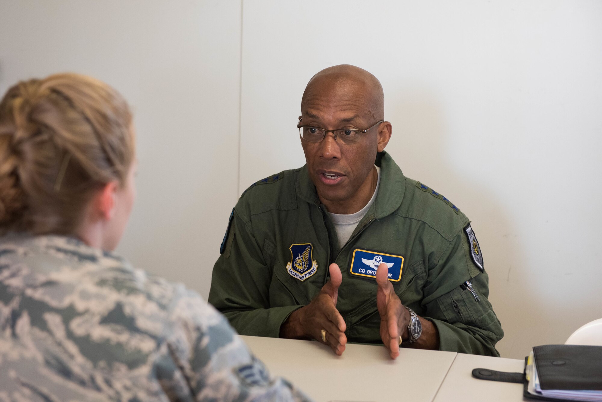 Gen. CQ Brown, Jr., Pacific Air Forces commander, is interviewed by Senior Airman Savannah Waters, 8th Fighter Wing public affairs photojournalist from Kunsan Air Base, Republic of Korea, during Exercise Pitch Black 18 at Royal Australian Air Force Base Darwin, Australia, Aug. 13, 2018. Waters is among the 4,000 personnel representing 16 nations at this year’s biennial multinational large force employment exercise hosted by the RAAF.    (U.S. Air Force photo by Staff Sgt. Hailey Haux)