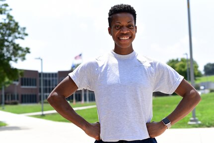 U.S. Air Force Tech. Sgt. Ebonie S. Hills stands outside the classroom building, August 16, 2018, where she instructs Airman Leadership School to junior Airmen at the Chief Master Sergeant Paul H. Lankford Enlisted Professional Military Education Center on McGhee Tyson Air National Guard Base in East Tennessee. Hills is a single mom who body builds in her spare time. She recently placed 1st in both the True Novice and Open classes for the Figure category at her first competition in Knoxville, Tenn.