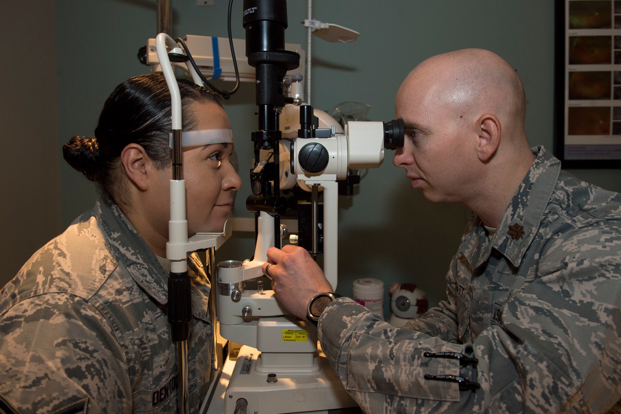 Photo of an eye exam administered by Maj. Kyle Hiatt