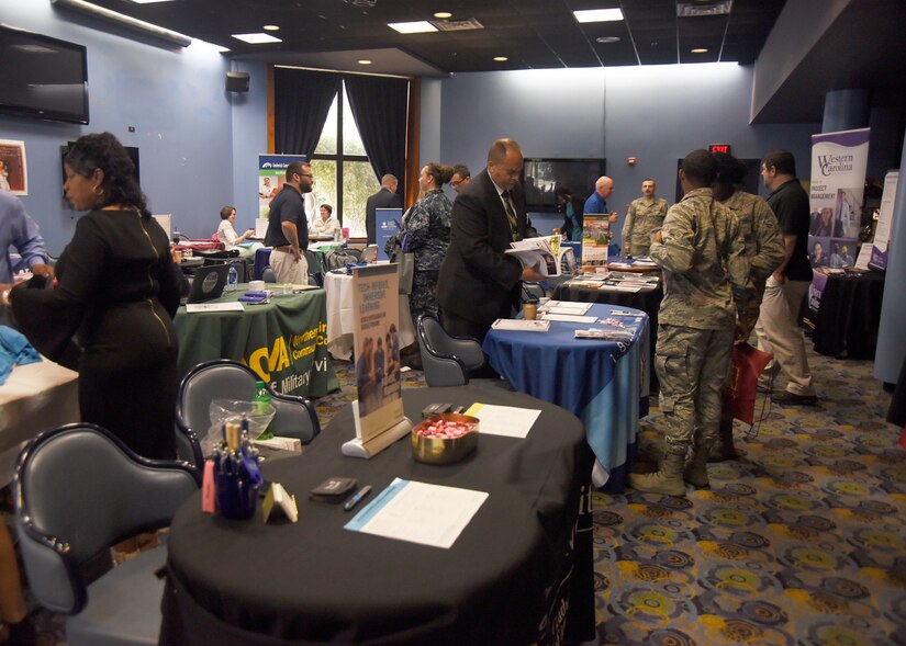 Representatives from a variety of colleges and universities work at booths to answer prospective student’s questions during an education fair at Joint Base Andrews, Md., Aug. 16, 2018. The fair gave anyone with base access the chance to talk to representatives from over 30 colleges and universities. (U.S. Air Force photo by Senior Airman Abby L. Richardson)