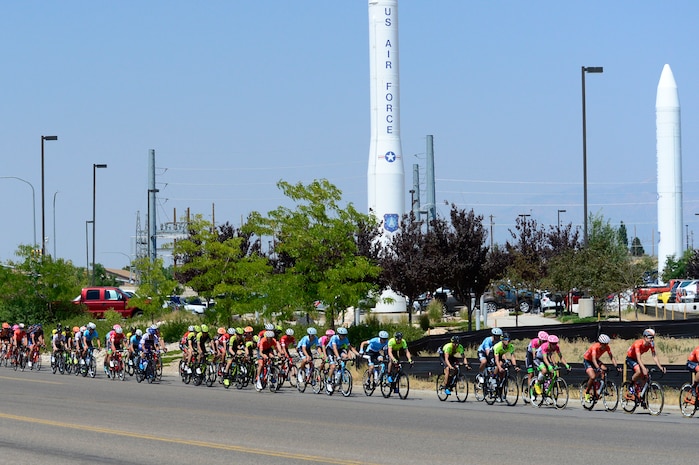 The peloton passes by a Minuteman III static display during stage 3 of the 2018 Tour of Utah road race Aug. 9, 2018, at Hill Air Force Base, Utah. The Tour of Utah is one of the top professional cycling events in the country and showcases some of the world’s best teams and cyclists. Stage 3 of the multiday race took riders on a 116-mile route from Antelope Island to Layton and included a loop through the installation. (U.S. Air Force photo by David Perry)