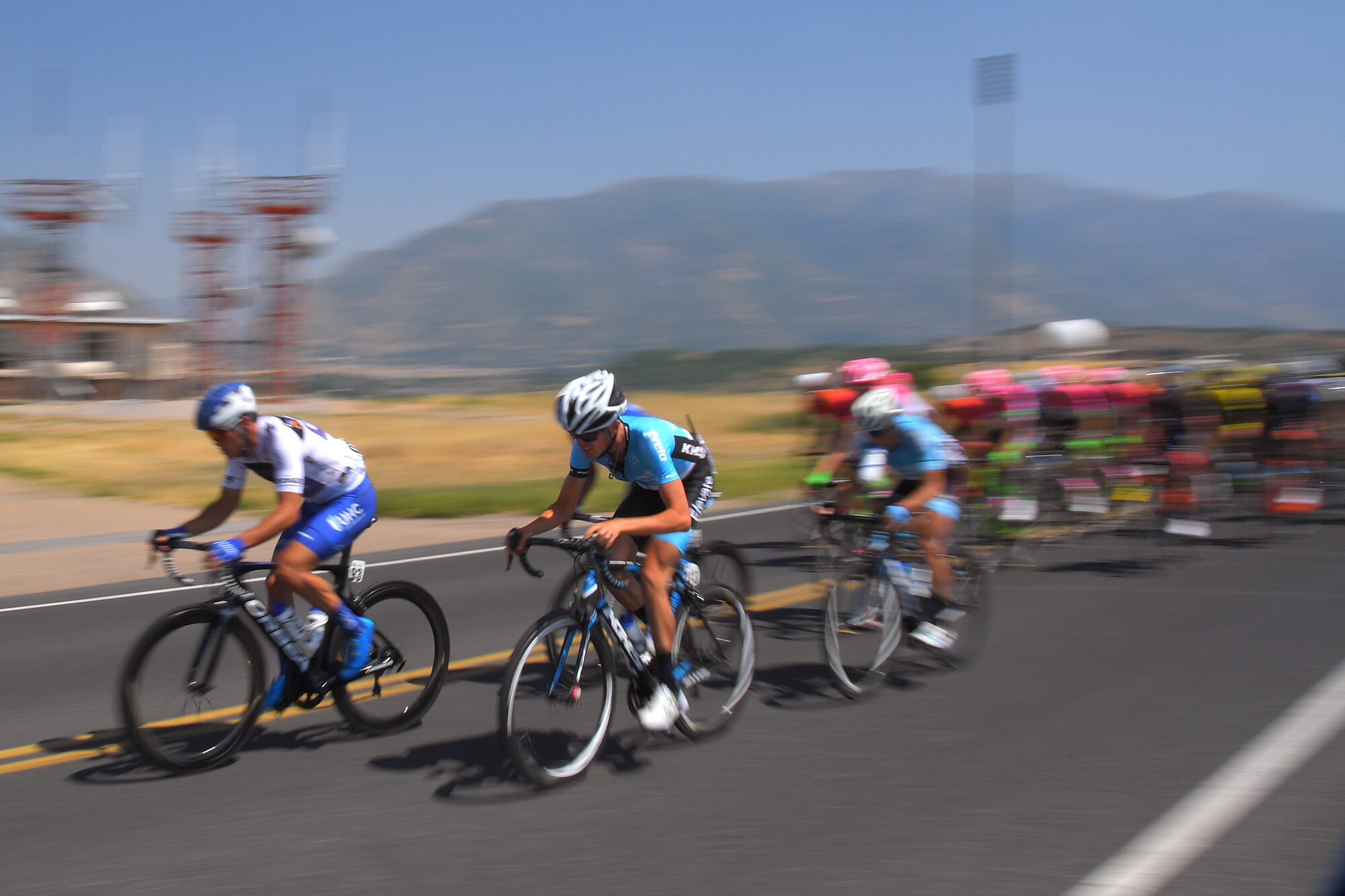 The peloton during stage 3 of the 2018 Tour of Utah road race Aug. 9, 2018, at Hill Air Force Base, Utah. The Tour of Utah is one of the top professional cycling events in the country and showcases some of the world’s best teams and cyclists. Stage 3 of the multiday race took riders on a 116-mile route from Antelope Island to Layton and included a loop through the installation. (U.S. Air Force photo by Todd Cromar)
