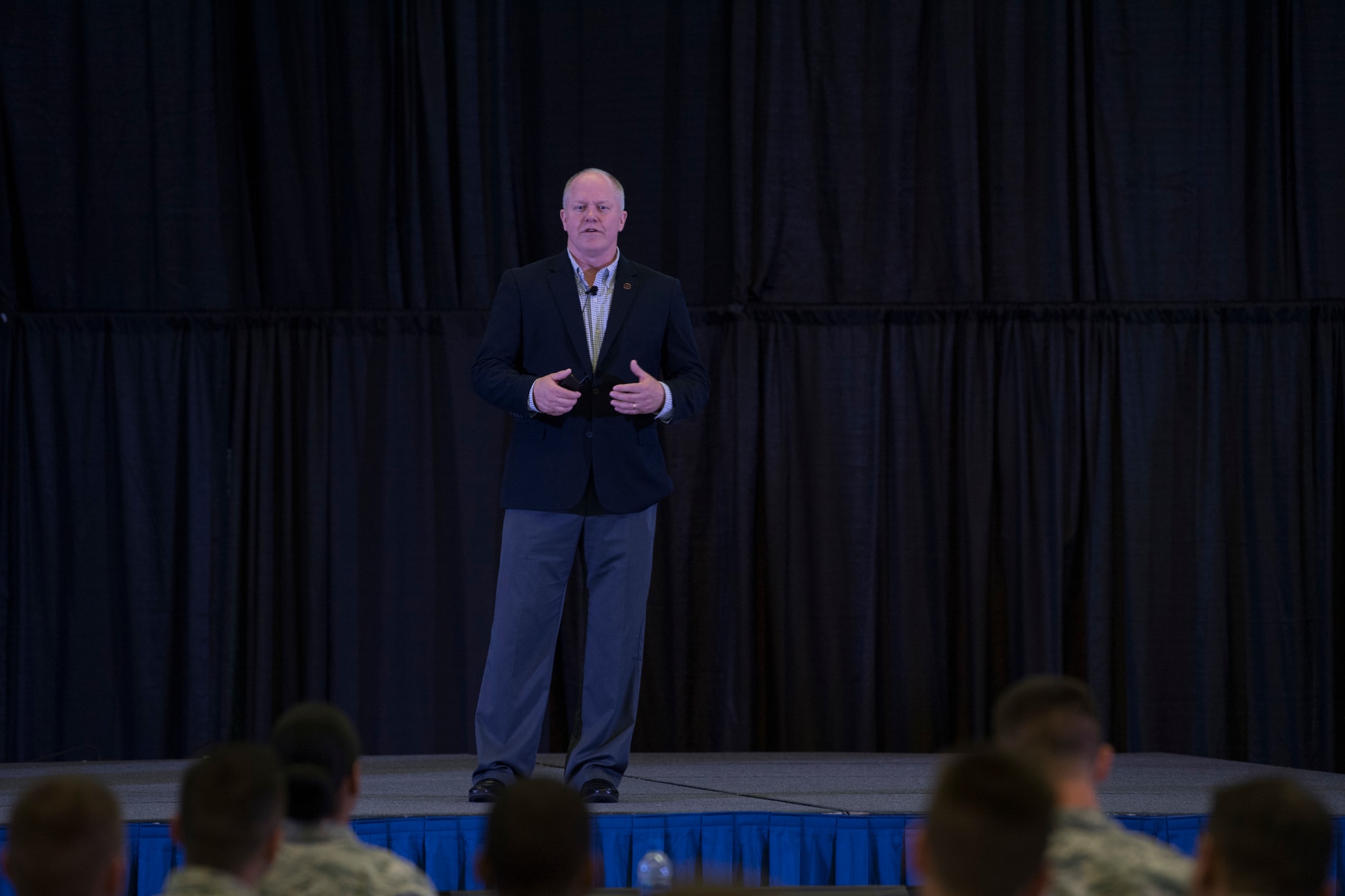 Chief Master Sgt. Chris Muncy (Ret.), former Command Chief Master Sgt. of the Air National Guard, talks with Airmen August 15, 2018 at the Enlisted Leadership Symposium at Camp Dawson, W.Va. More than 400 Airmen representing Air National Guard units from each state and territory attended the ELS, a three-day event focused on leadership and professional development. (U.S. Air National Guard Photo by Airman 1st Class Caleb Vance)
