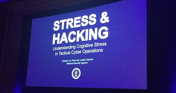 Photo of title slide of Black Hat conference presentation, Stress and Hacking: Understanding Cognitive Stress in Tactical Cyber Operations
