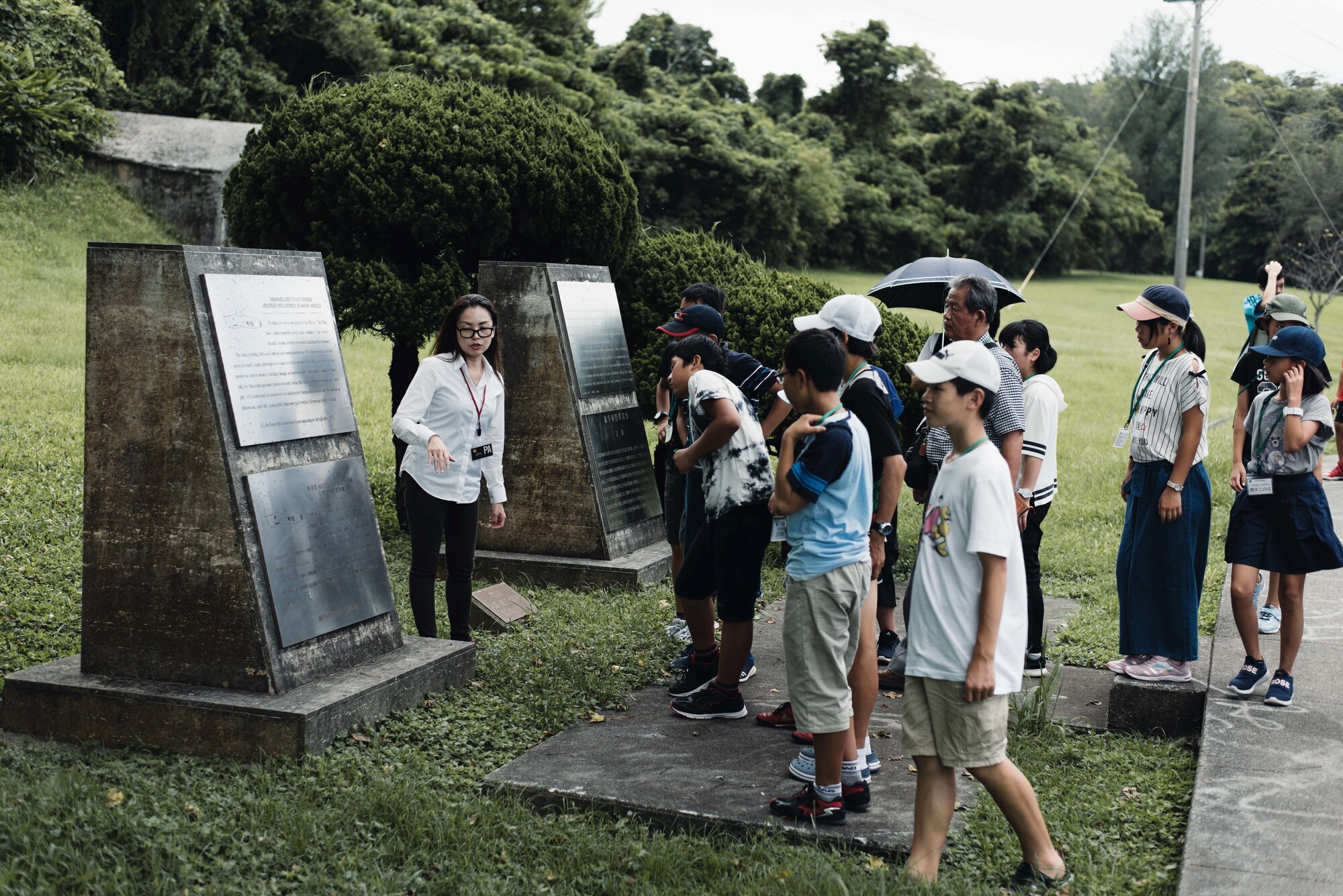 Children from both Achi Village of Shimoina District, Nagano Prefectre and Okinawa City, Japan, visited Kadena Air Base to visit historical World War II sites, Aug. 6, 2018.