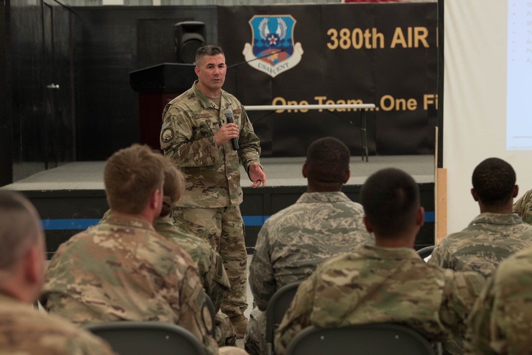 Lt. Col. Andrew Frankel, Deputy Air Reserve Component advisor, speaks to Air Reserve and Air National Guard members at a town hall meeting on Al Dhafra Air Base, Aug. 9, 2018. Frankel, along with Col. Cory Reid, Senior Air Reserve Component advisor, tour the AOR to inform Guard and Reserve members on their entitlements earned while deployed. (U.S. Air Force photo by Staff Sgt. Erica Rodriguez)