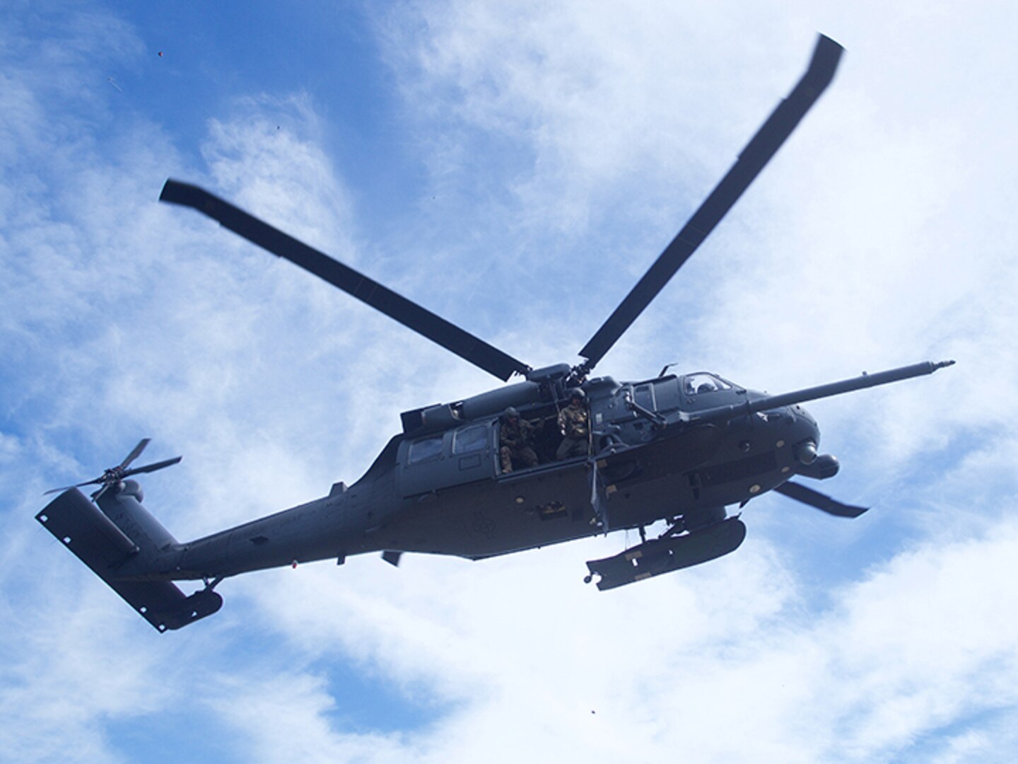 A 210th Rescue Squadron HH-60G Pave Hawk conducts hoist training June 5, 2018, at Eklutna Glacier. Alaska Air National Guard members used similar aircraft to rescue five people in two incidents over the weekend.