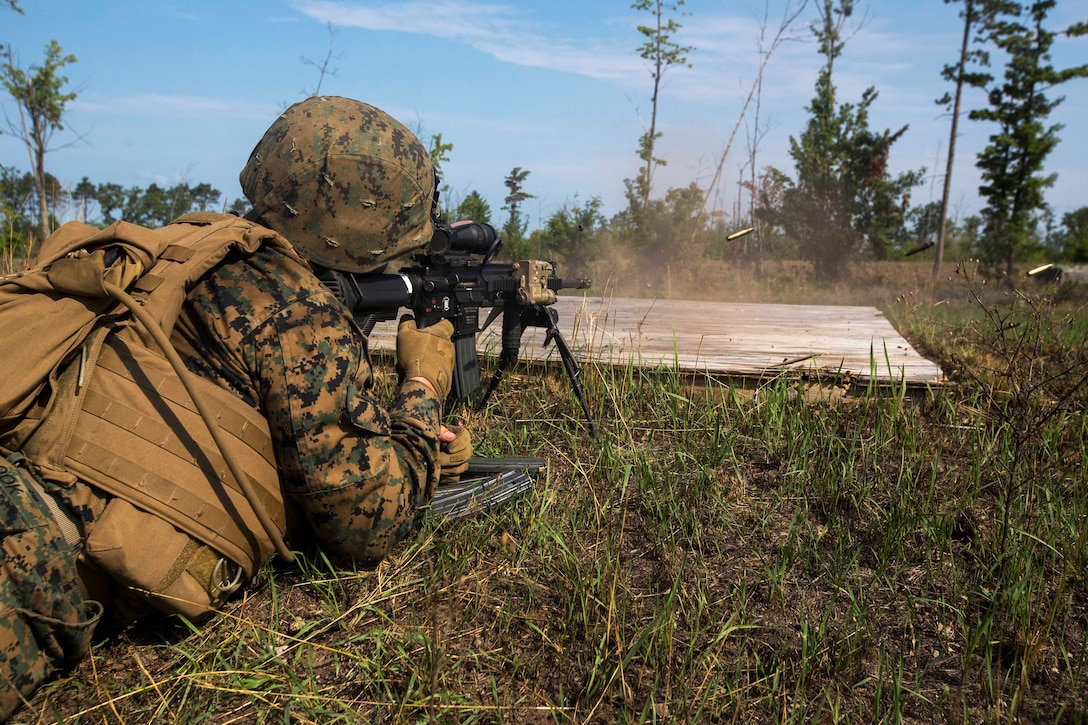 A Marine fires his weapon during a live-fire exercise.