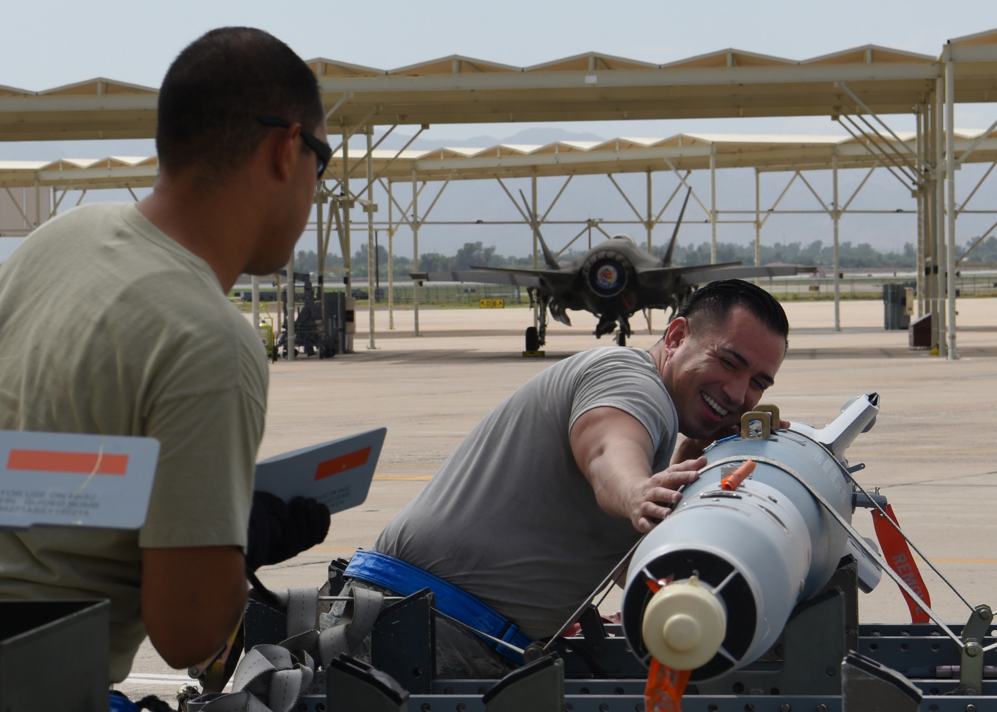 U.S. Air Force Reserve Air Force Reserve Tech Sgt. Jose Contreras, 62nd Aircraft Maintenance Unit F-35 Lightning II weapons load crew member and Staff Sgt. Joe Hernandez, 62nd AMU F-35A Lightning II weapons team chief, inspects munitions prior to being loaded onto aircraft, Aug. 15, 2018 at Luke Air Force Base, Ariz.