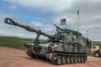 A Paladin howitzer from Battery B, 2nd Battalion, 222nd Field Artillery Regiment, 65th FA Brigade, Utah Army National Guard, pulls into the machine gun range on Camp Guernsey, Wyo., May 14, 2016, during Operation Gunsmoke 16. Operation Gunsmoke is the 65th Field Artillery Brigade live-fire exercise consisting of 1,300 Soldiers from six states, conducting operations in Camp Guernsey for annual training 2016.