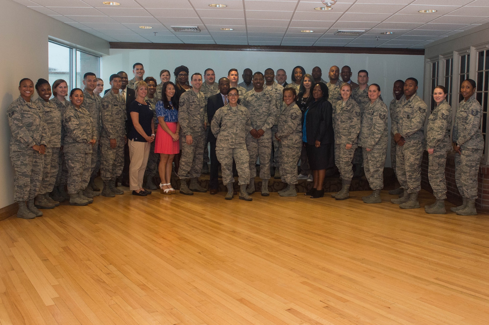 U.S. Air Force equal opportunity specialists assigned to Air Combat Command installations take a group photo during an EO conference at Joint Base Langley-Eustis, Virginia, July 30, 2018. The conference served as an opportunity for EO specialists to gain experience, discuss priorities, challenges and policy requirements. (U.S. Air Force photo by Senior Airman Derek Seifert)