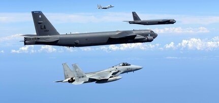 Two U.S. Air Force B-52H Stratofortress bombers and two Koku Jieitai (Japan Air Self-Defense Force) F-15 fighters execute a routine bilateral training mission in the vicinity of Japan, July 26, 2018. This mission was flown in support of U.S. Indo-Pacific Command’s Continuous Bomber Presence (CBP) operations, which are a key component to improving combined and joint service interoperability. Bilateral training missions such as this allow the two countries to improve upon combined capabilities, tactical skills, and relationships.