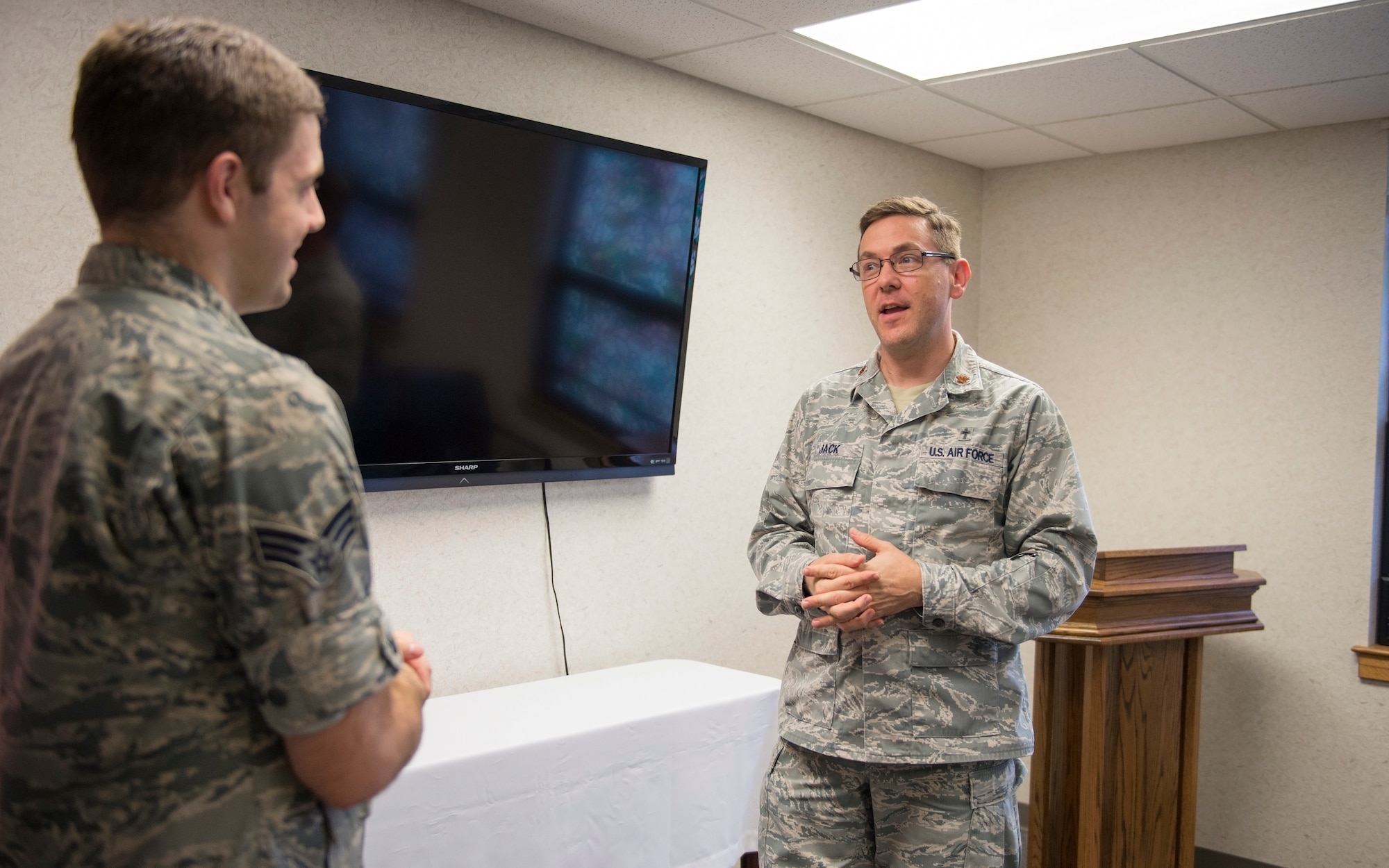 Chaplain (Maj.) Alex jack, 434th Air Refueling Wing chaplain, talks with Senior Airman Jeffrey Withrow, 434th Air Refueling Wing public affairs specialist, in the chapel at Grissom Air Reserve Base, Ind., Aug. 20, 2018. Chaplain Jack will be hosting a Pre-Deployment Relationship Sustainment Skills class here Sept. 9, 2018. (U.S. Air Force photo/Staff Sgt. Jami K. Lancette)