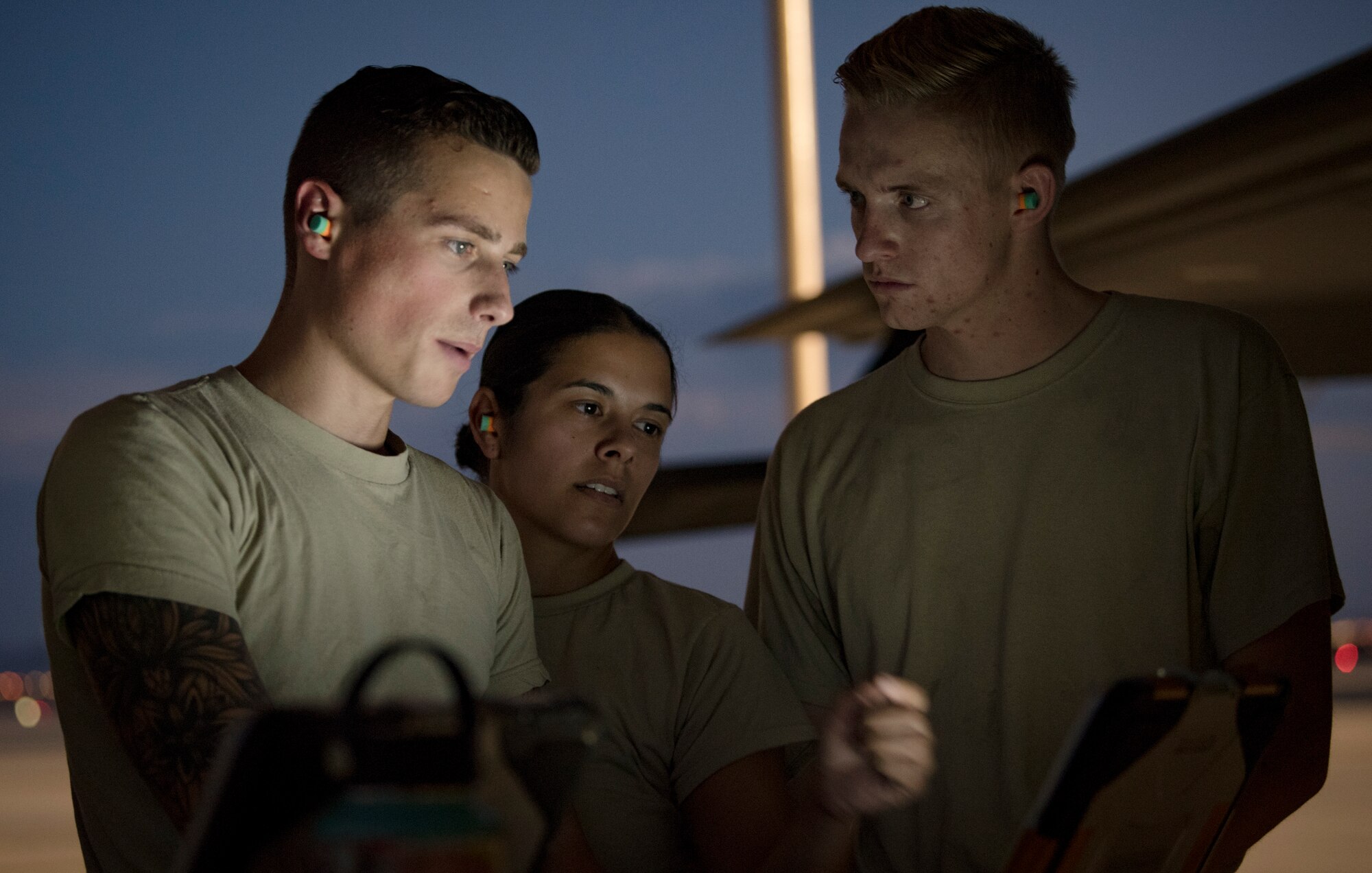 Senior Airman Alan Roach, Staff Sgt. Samantha Stimeling and Airman 1st Class Nolan Delongey, 57th Aircraft Maintenance Squadron Lightning Aircraft Maintenance Unit armament systems technicians, perform tests on an F-35A Lightning II fighter jet at Nellis Air Force Base, Nevada, July 24, 2018. Armament systems technicians frequently test and evaluate the weapon systems on aircraft to ensure everything is in working order. (U.S. Air Force photo by Airman 1st Class Andrew D. Sarver)
