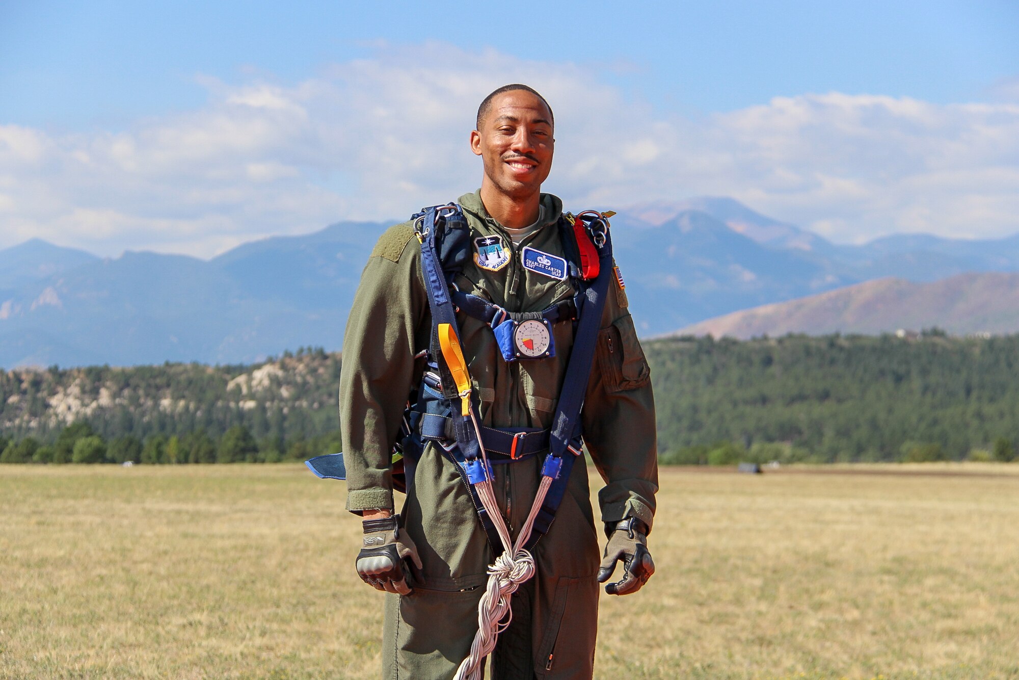 Staff Sgt. Charles Carter poses for a photo after successfully completing one of his five solo parachute jumps as part of the Air Force Academy's Airmanship 490 course. (Courtesy photo)