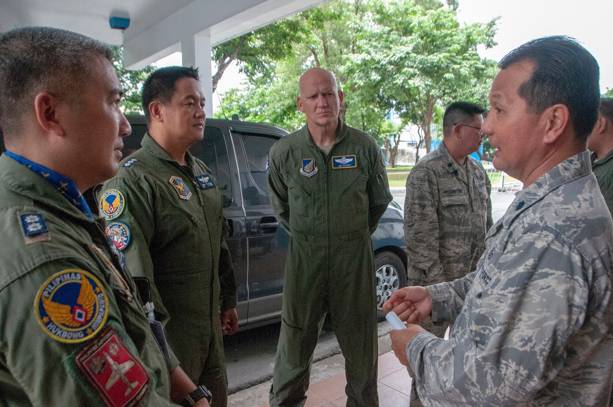 Senior air defense experts from the Hawaii Air National Guard and Philippine Air Force discuss air defense development during a visit to the Philippine Air Defense Control Center