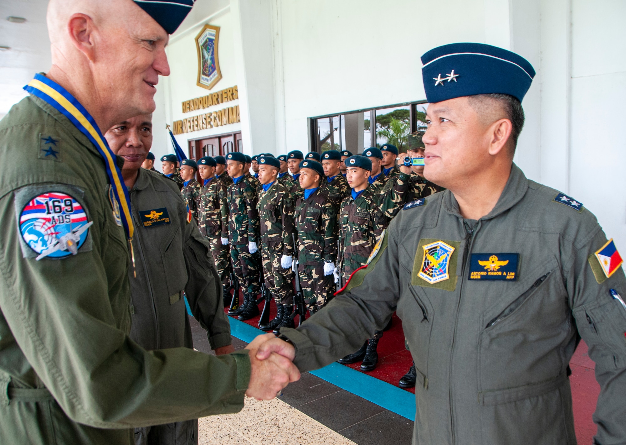 Maj. Gen. James O. Eifert, Air National Guard Assistant to the Commander, Pacific Air Forces shakes hands with Philippine Air Force Maj. Gen. Antonio Ramon A. Lim