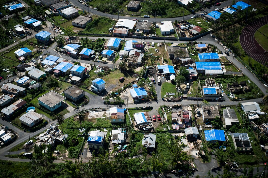 An aerial view of damaged homes near Añasco, Puerto Rico, Oct. 31, 2017. Hurricane Maria formed in the Atlantic Ocean and affected islands in the Caribbean Sea, including Puerto Rico and the U.S. Virgin Islands. U.S. military assets supported FEMA as well as state and local authorities in rescue and relief efforts. (U.S. Air Force photo by Tech. Sgt. Larry E. Reid Jr.)