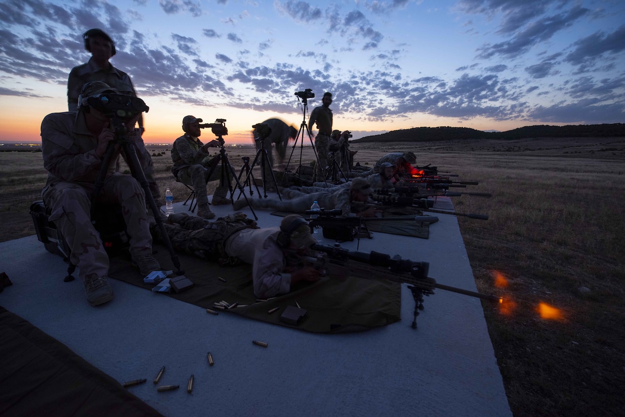 Sniper team collects ballistic data.