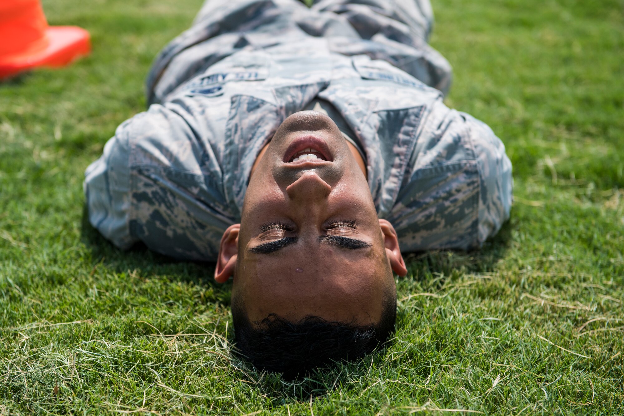 An Airman performs an obstacle during an obstacle course.