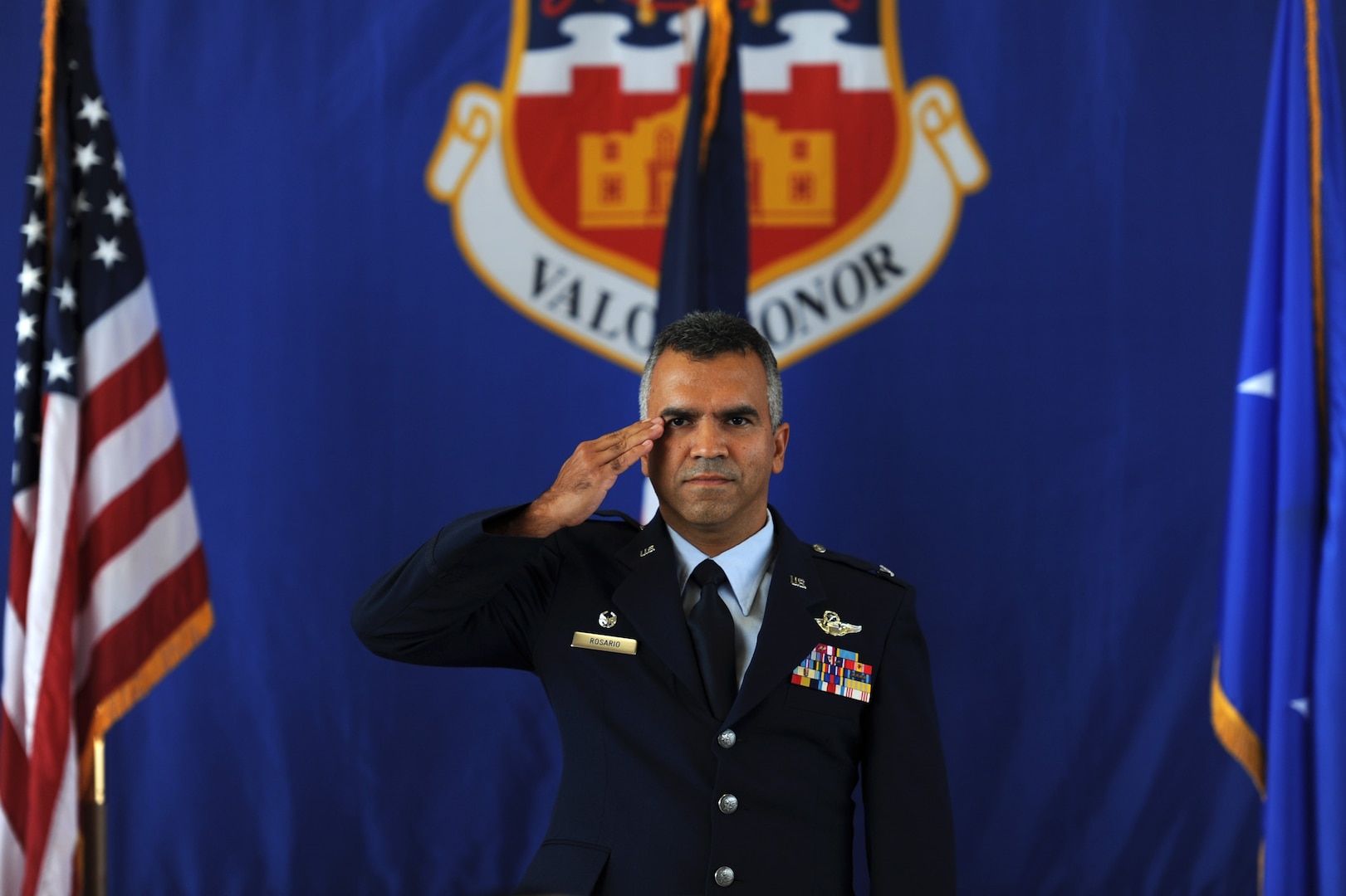 Col. Raul Rosario, incoming commander of the 149th Fighter Wing headquartered at Joint Base San Antonio-Lackland, Texas, receives his first salute as commander during a change of command ceremony Aug. 18 in the main hanger of the 149th FW.