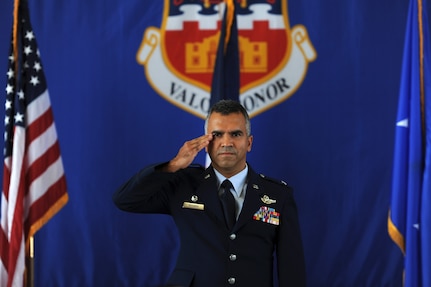 Col. Raul Rosario, incoming commander of the 149th Fighter Wing headquartered at Joint Base San Antonio-Lackland, Texas, receives his first salute as commander during a change of command ceremony Aug. 18 in the main hanger of the 149th FW.