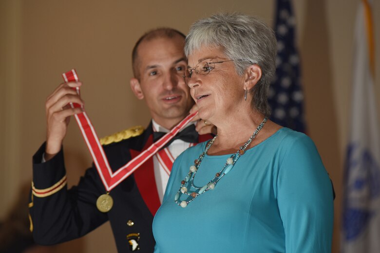 Col. Paul J. Kremer, U.S. Army Corps of Engineers Great Lakes and Ohio River Division deputy commander, presents the Bronze Order of the De Fleury Medal to Patty Coffey, Nashville District deputy district engineer, during the Nashville District 130th Anniversary Ball Aug. 18, 2018 at the Embassy Suites in Nashville, Tenn. (USACE Photo by Lee Roberts)