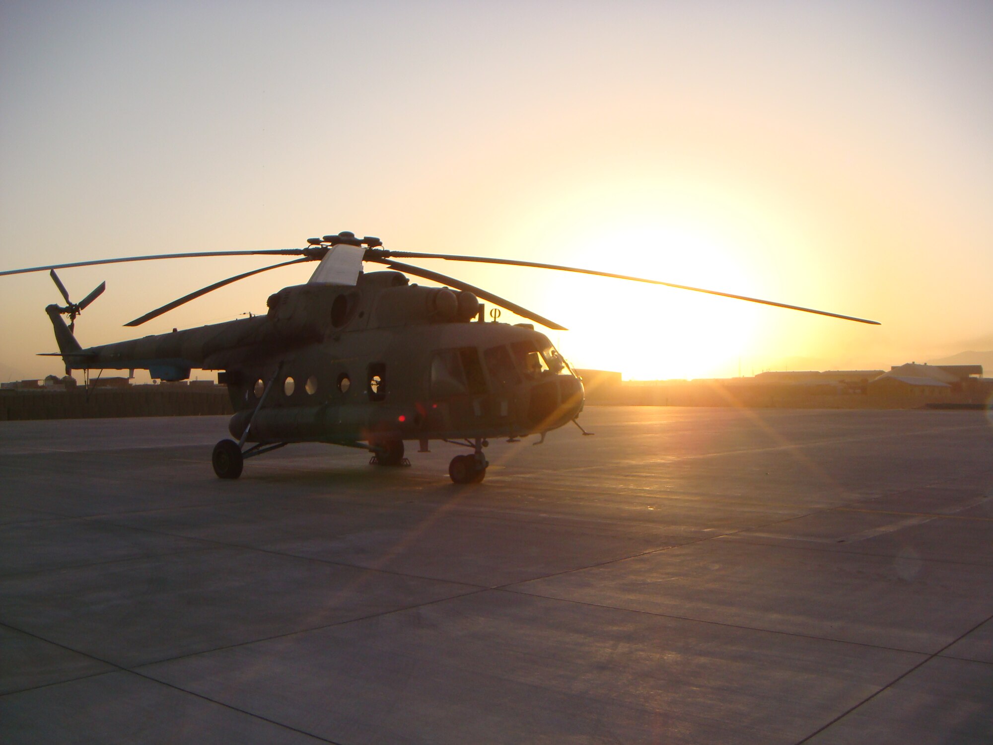 Matthew, Northrup-Grumman chief pilot, prepares to take off in his Russian Mi-17 helicopter in Afghanistan in 2011. During this point in his career, Matthew also served in the U.S. Army Reserves while taking seminary classes online which would lead to his current assignment as a U.S. Air Force chaplain at Creech Air Force Base, Nev. (courtesy photo)