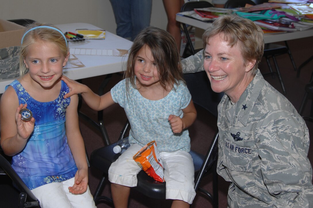 Former 349th AMW commander makes history