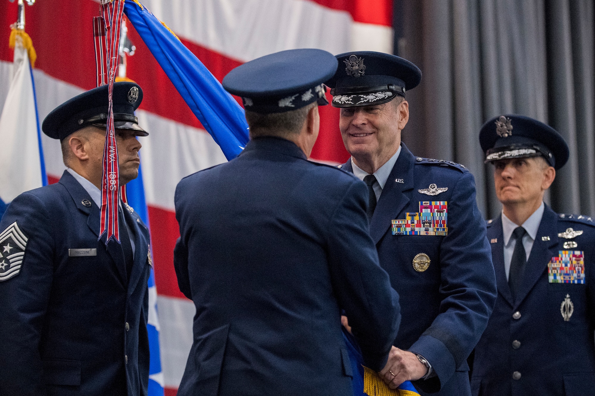 Gen. Robin Rand relinquishes the Air Force Global Strike Command flag to Air Force Chief of Staff Gen. David L. Goldfein
