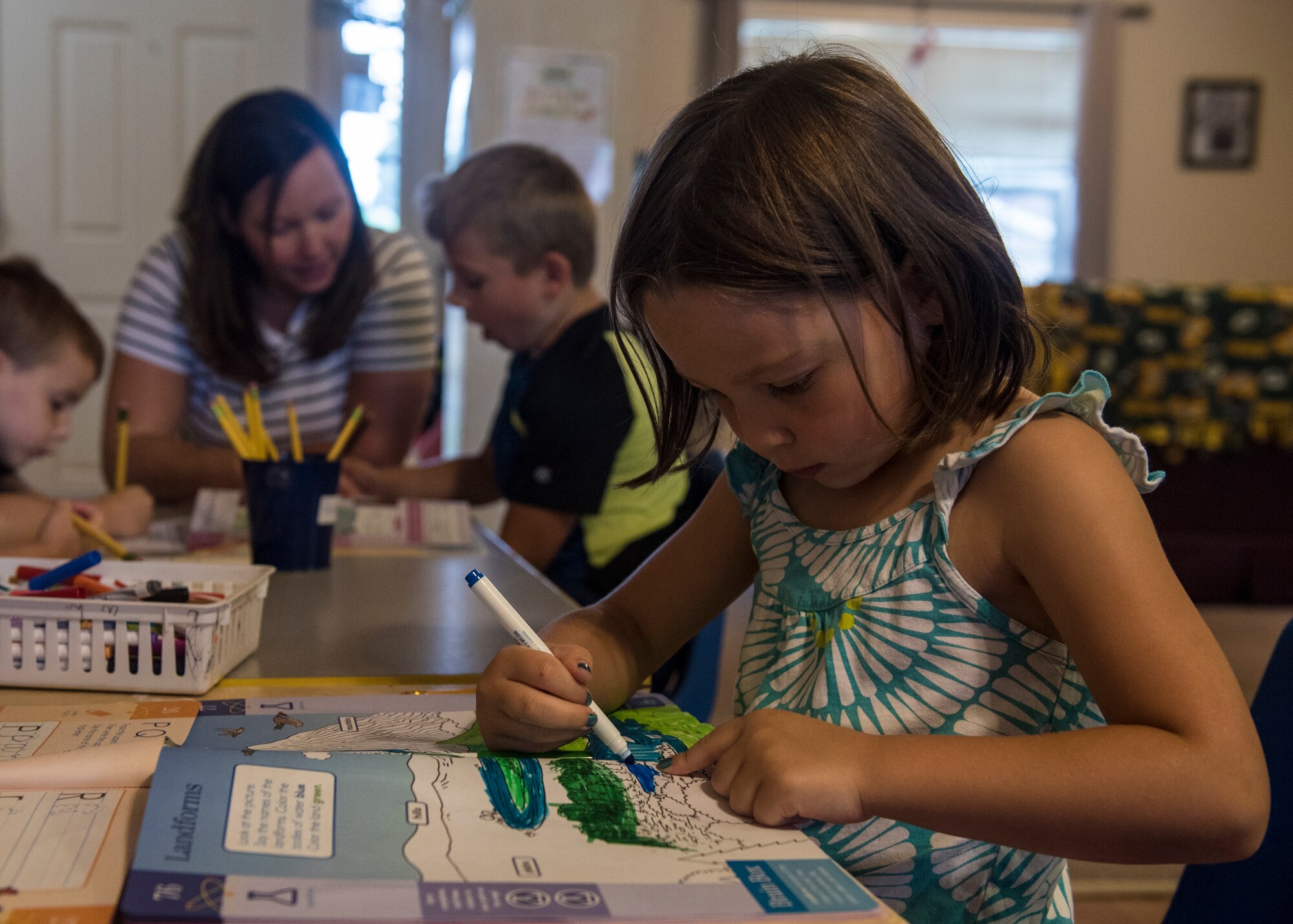 Team Fairchild families use the Family Child Care program to care for their children during the duty day at Fairchild Air Force Base, Washington, Aug. 16, 2018. FCC providers offer children a consistent and personal learning space in an in-home environment. (U.S. Air Force photo/Airman 1st Class Whitney Laine)