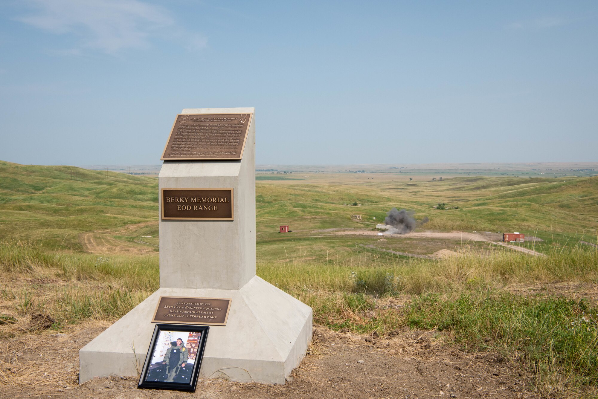 A controlled detonation is triggered during a range dedication ceremony at Ellsworth Air Force Base, S.D., Aug. 17, 2018. The range was named in honor of Staff Sgt. Bryan D. Berky, an explosive ordnance disposal technician deployed from Ellsworth AFB who was killed in action on Sept. 12, 2009, while serving in the western province of Farah, Afghanistan. (U.S. Air Force photo by Tech. Sgt. Jette Carr)