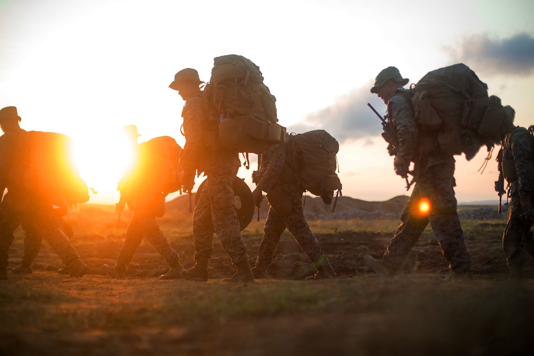 U.S. Marines hike to a range during the exercise.